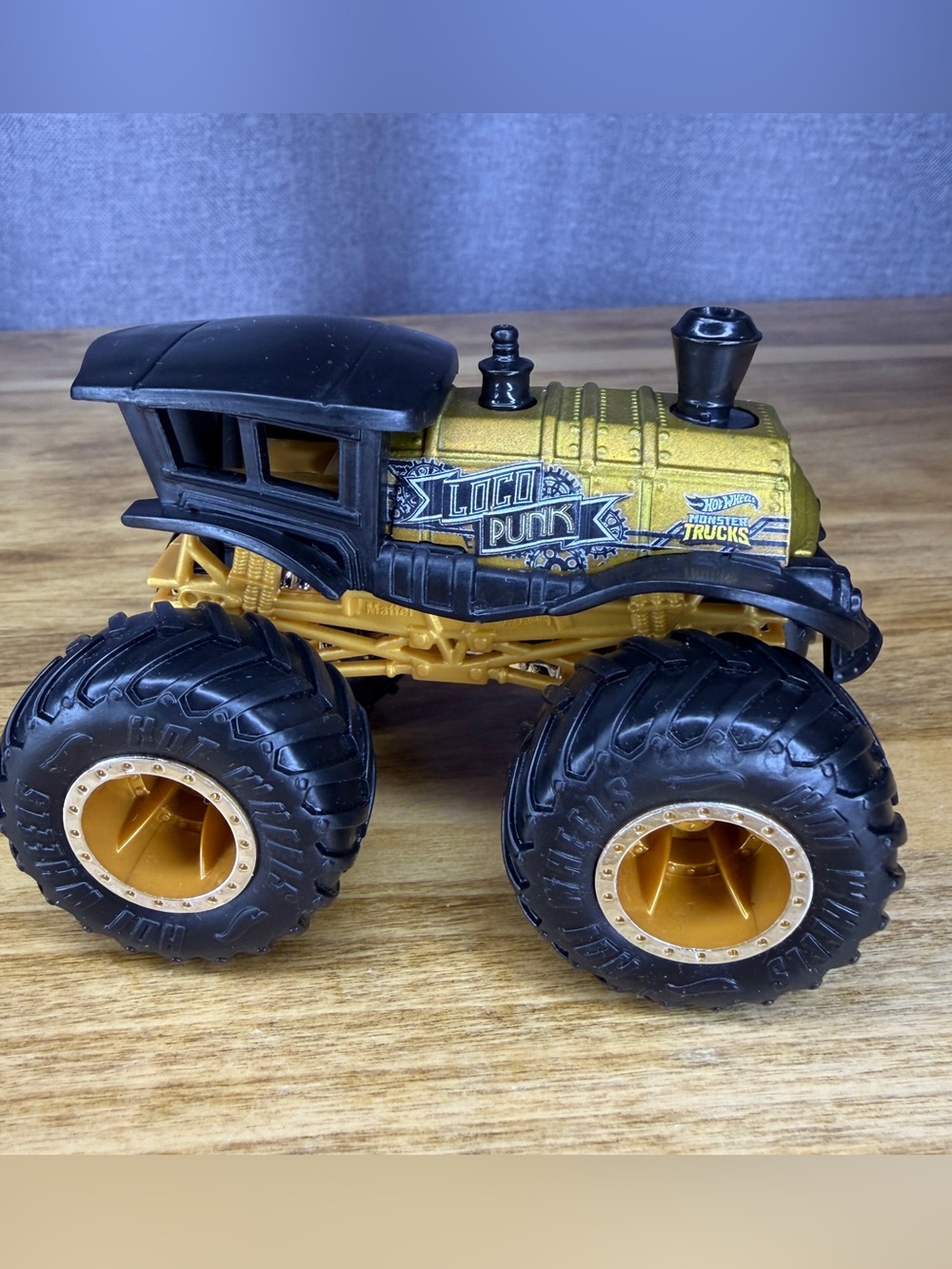 Hot Wheels Monster Truck Loco Punk Train Gold and Black Wheels Toy